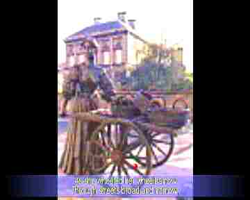 As she wheeled her wheelbarrow